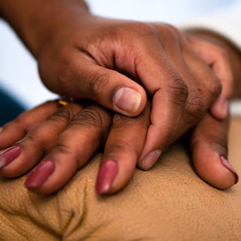 Close-up of a person holding their hands